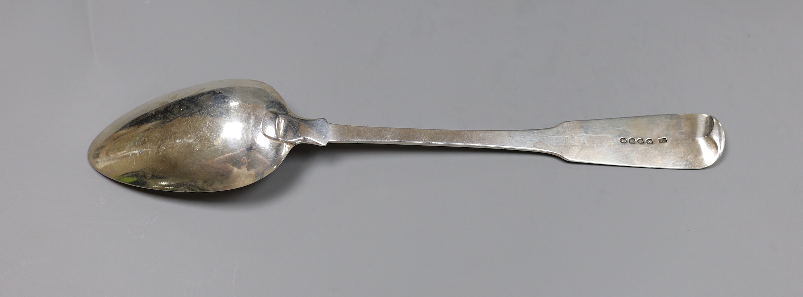 A George III silver fiddle pattern basting spoon, initialled P, London 1821, 4.5 oz.